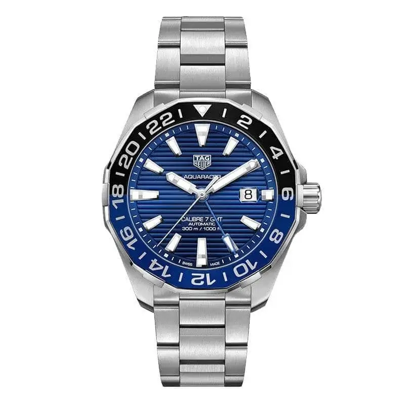 A TAG Heuer AQUARACER automatic mechanical watch featuring a stainless steel case and bracelet, with a blue gradient dial and unidirectional ceramic bezel. The dial includes luminous hour markers and hands, a date window at 3 o'clock, and a water resistance of 300 meters, combining sporty design with exceptional performance.